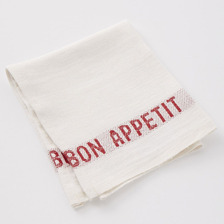 Leinenserviette von Charvet mit eingewebten Schriftzug weiss-rot